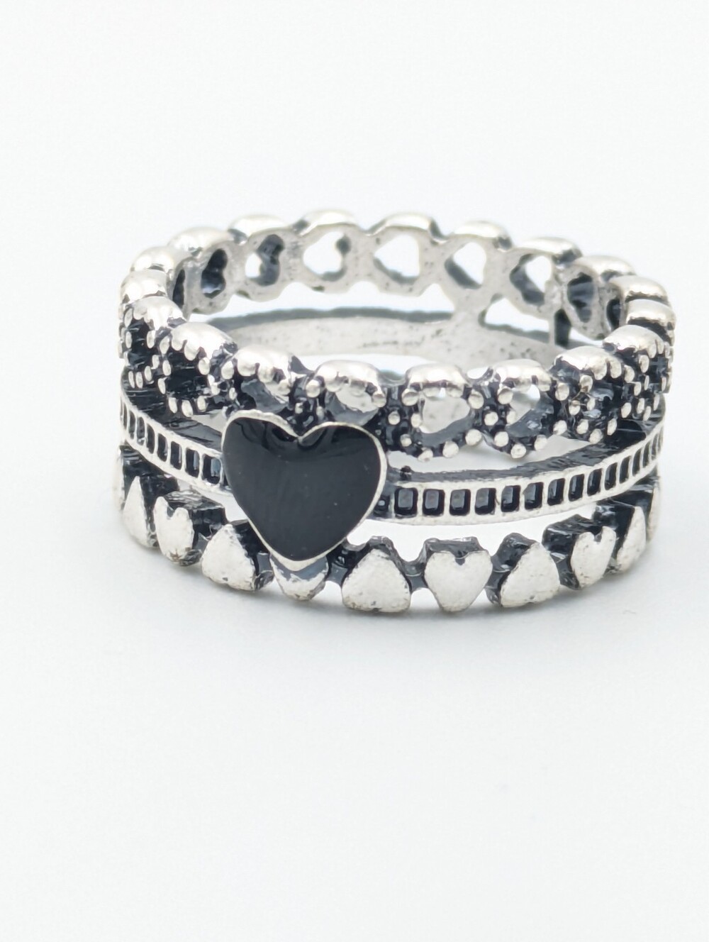 Silver tone and black enamel heart ring